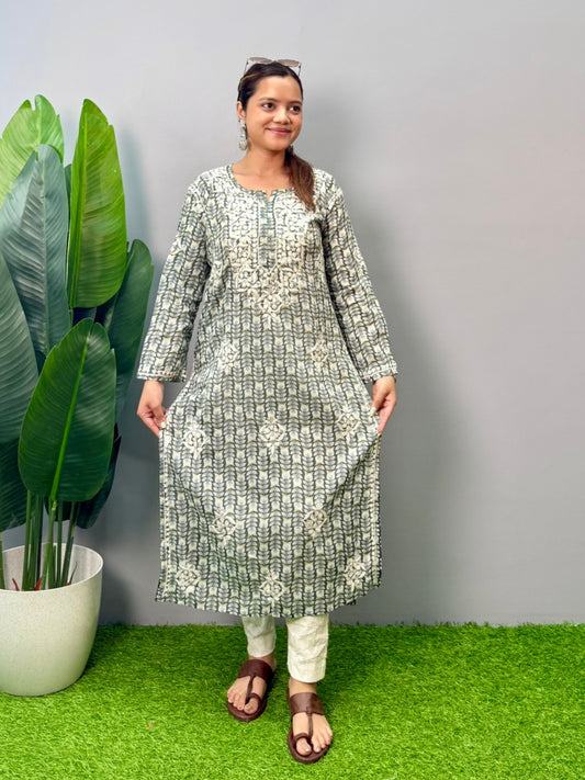 Model wearing olive grey printed chikankari kurta in mulmul fabric with white hand embroidery