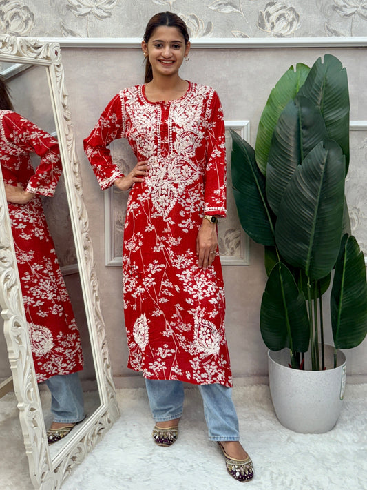 Red printed mulmul Lucknow Chikankari kurta with white floral design and hand embroidery.