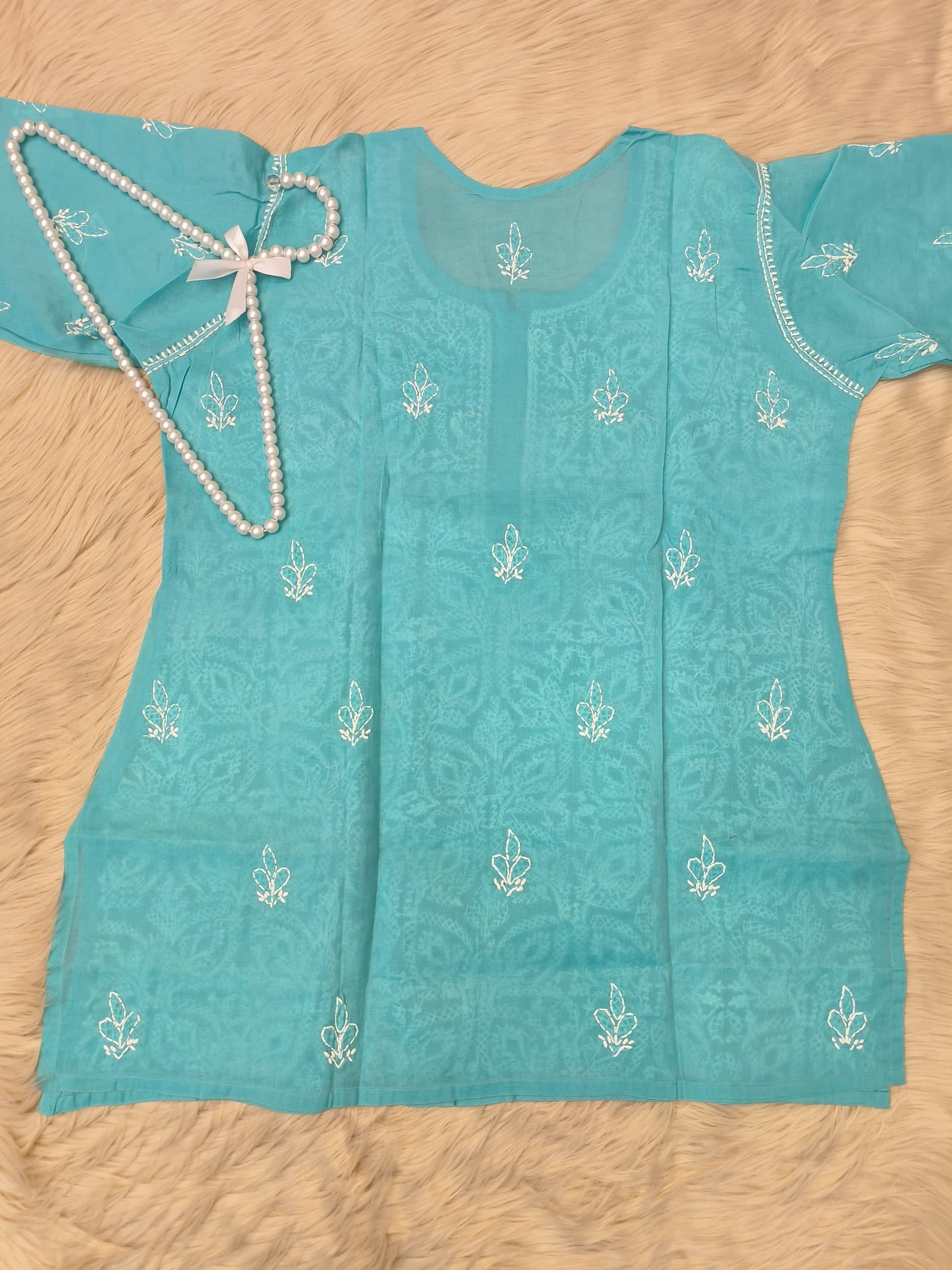 Sea green short voile cotton chikankari kurta with white hand embroidery and bakhiya work