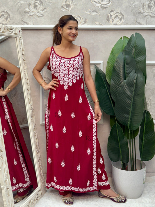 Deep maroon sleeveless Lucknow Chikankari rayon kurta and pant set with white hand embroidery.