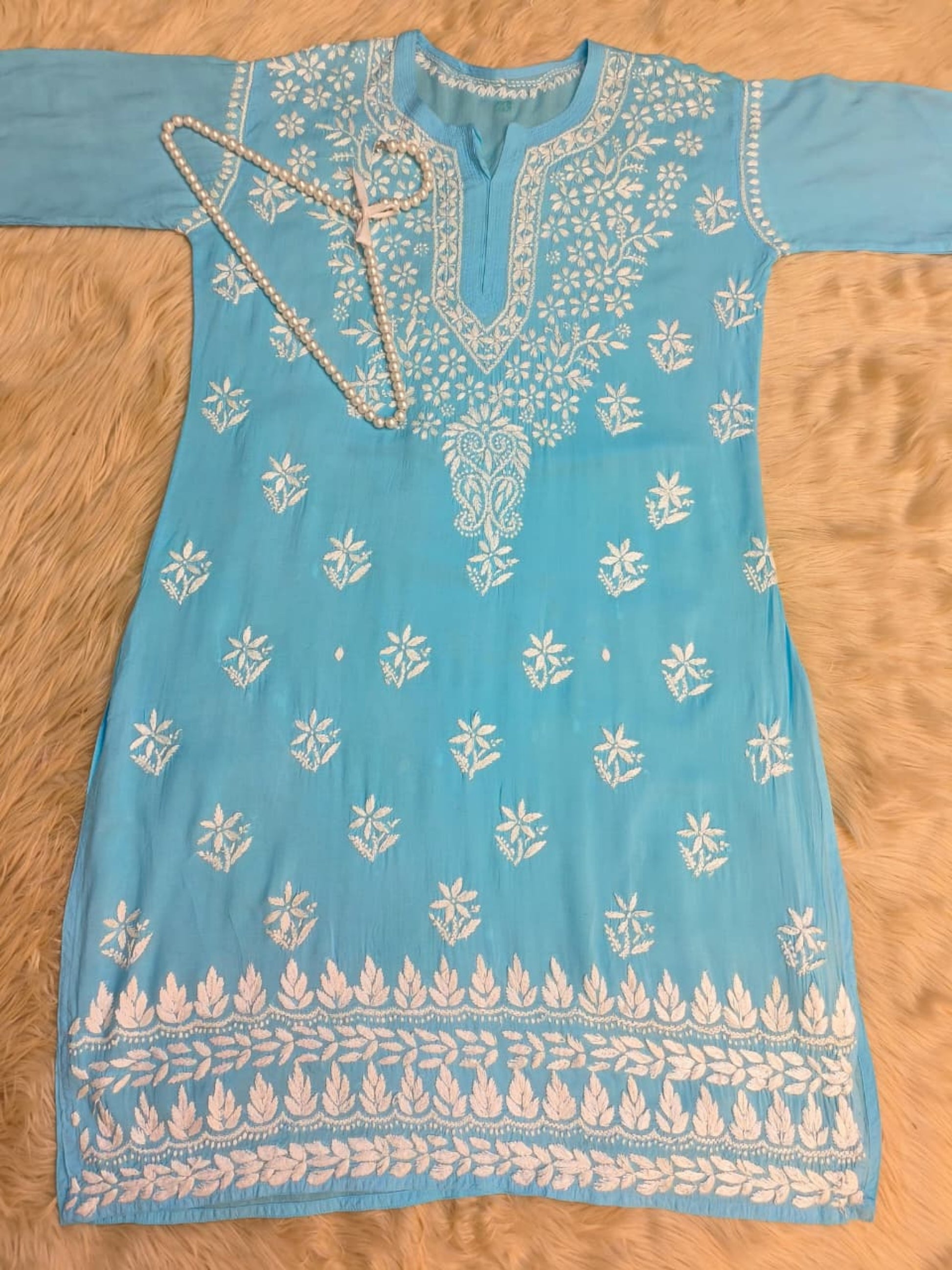 Aqua blue modal Lucknow Chikankari kurta with white hand embroidery, premium quality.