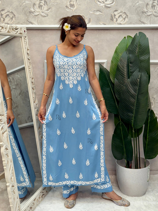 Sky blue sleeveless Lucknow Chikankari rayon kurta and pant set with white hand embroidery.
