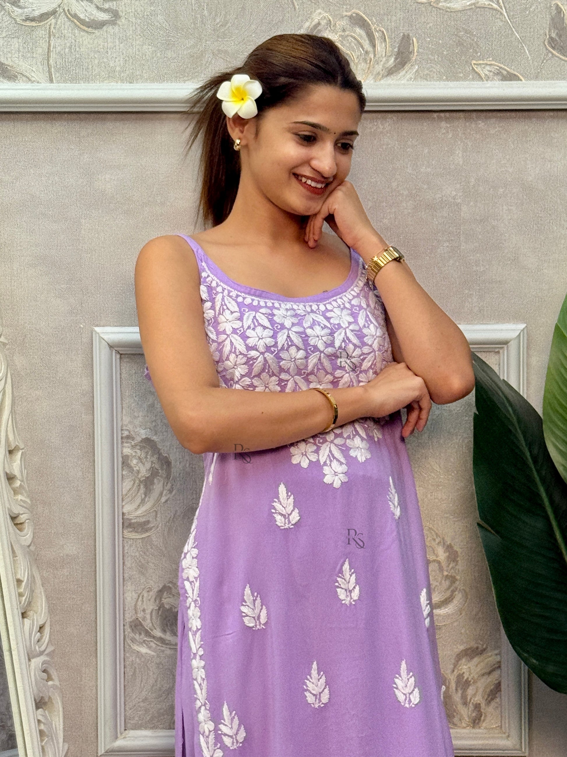 Lavender sleeveless Lucknow Chikankari rayon kurta and pant set with white hand embroidery.