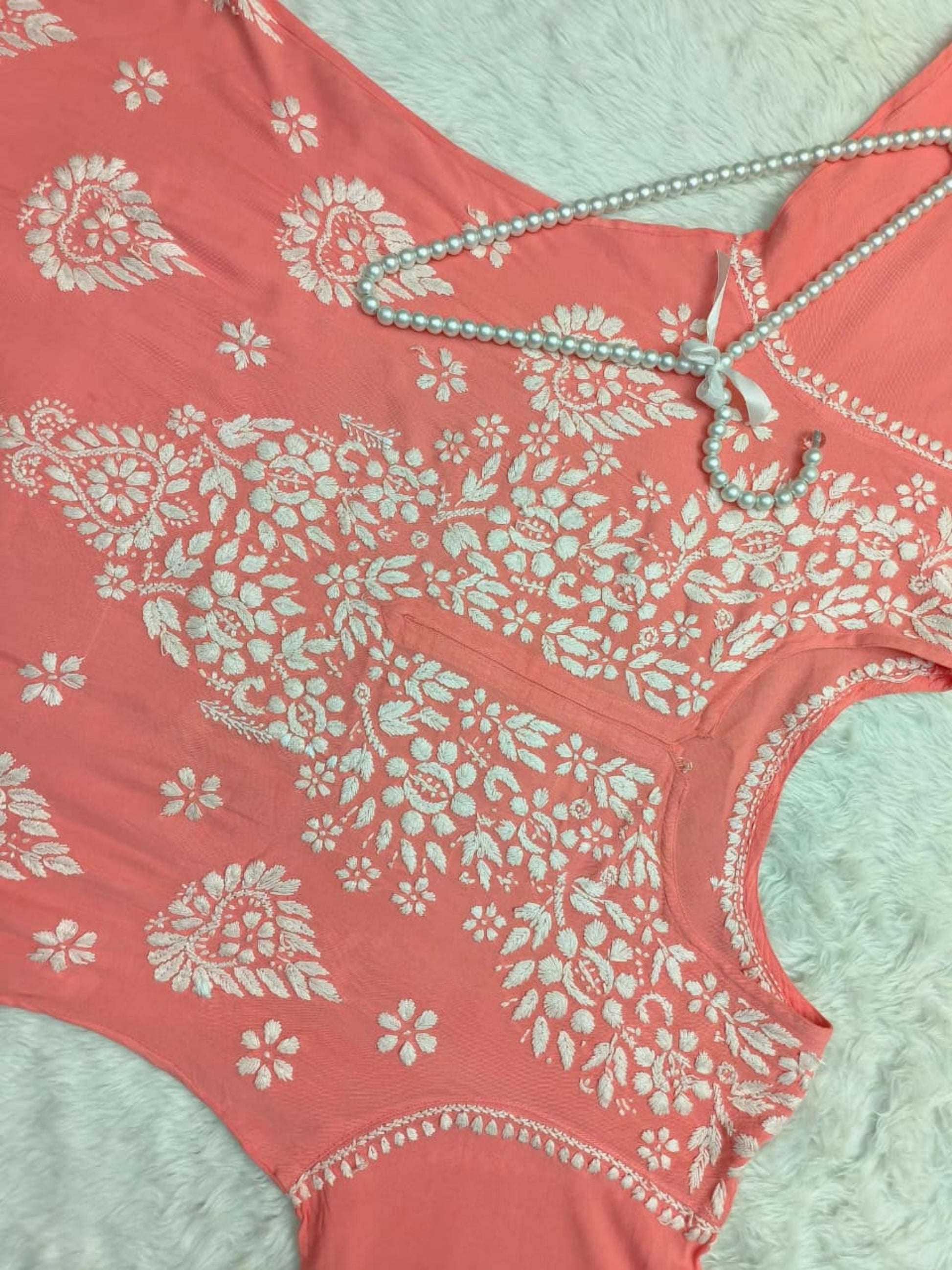 Coral peach rayon Lucknow chikankari kurta and pant set with white hand embroidery