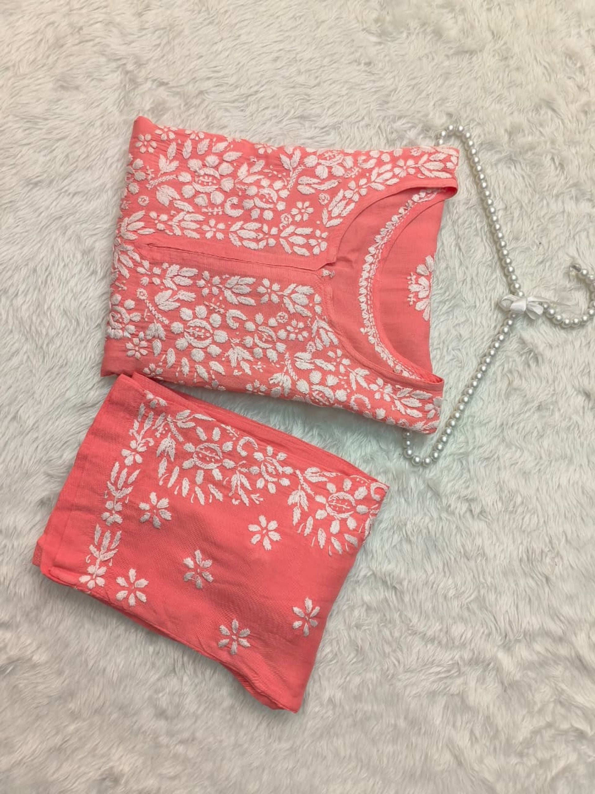 Coral peach rayon Lucknow chikankari kurta and pant set with white hand embroidery