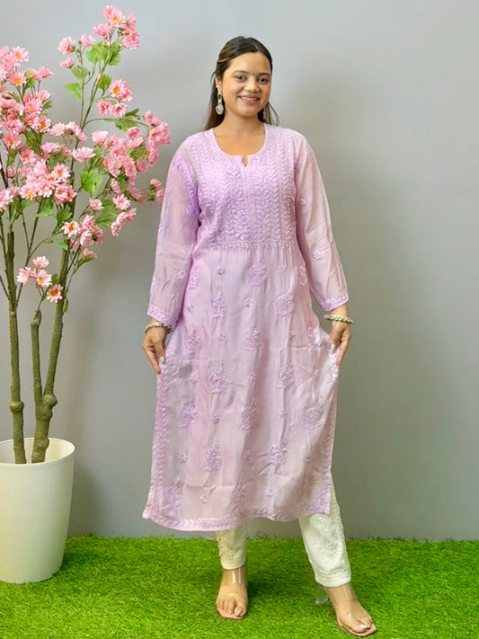 Woman wearing lilac muslin Lucknow chikankari kurta with hand embroidery