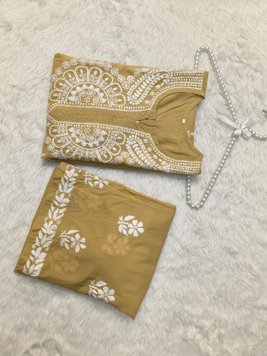 Camel brown cotton Lucknow Chikankari kurta with matching palazzo set, hand-embroidered in white thread.