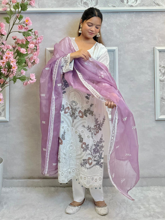 Model wearing a white embroidered georgette kurta with lycra stretchable pants and lavender embroidered georgette dupatta – Designer Wear Collection.