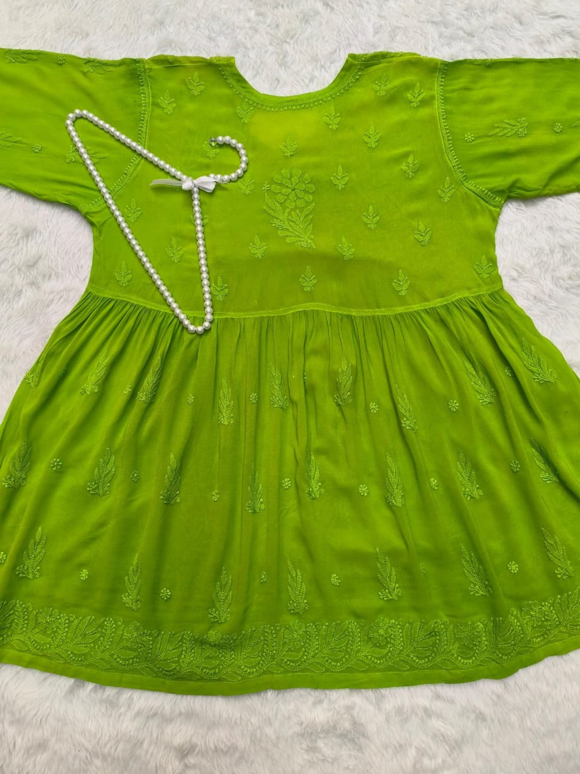 Green Lucknow Chikankari viscose short kurta with hand embroidery in Angrakha style