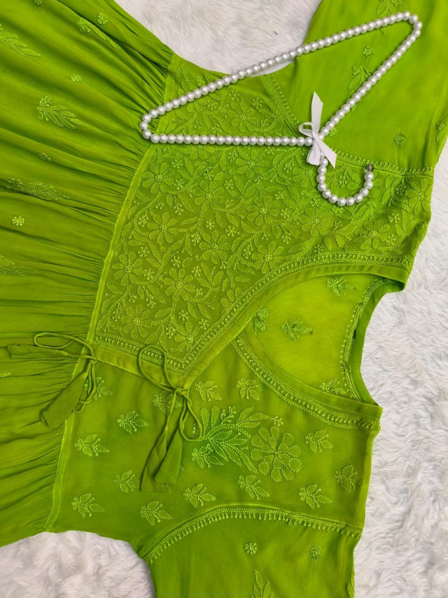 Green Lucknow Chikankari viscose short kurta with hand embroidery in Angrakha style