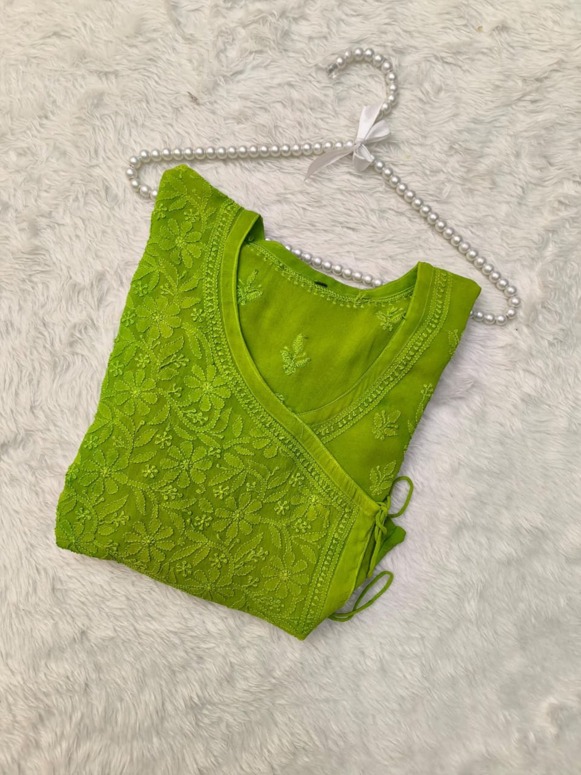 Green Lucknow Chikankari viscose short kurta with hand embroidery in Angrakha style