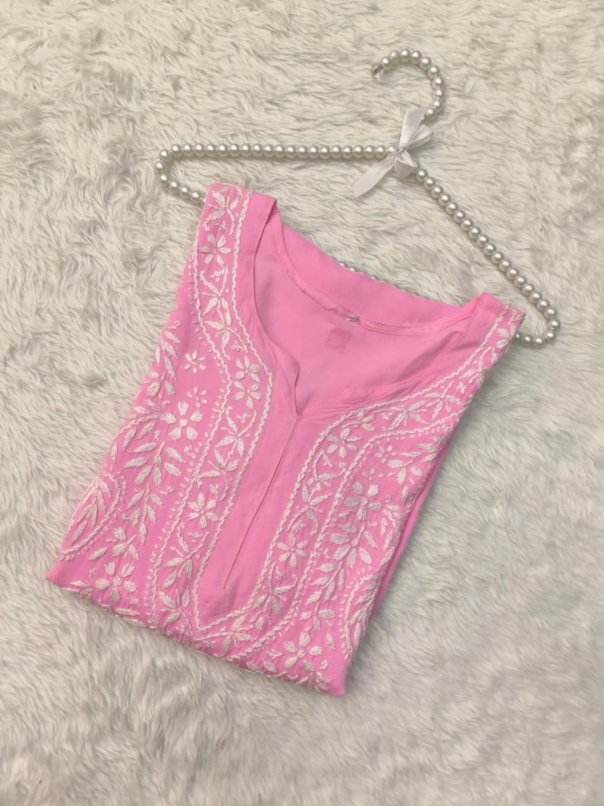 Pink rayon Lucknow chikankari kurta with hand embroidery – soft and comfortable.