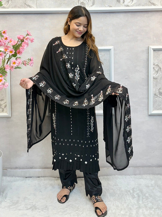 Model wearing a black embroidered georgette kurta with lycra stretchable pants and georgette embroidered dupatta – Designer Wear Collection.