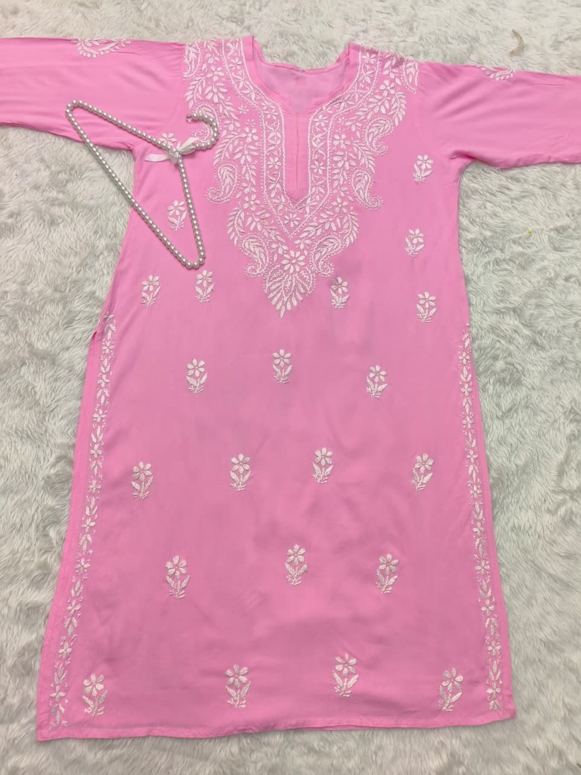 Pink rayon Lucknow chikankari kurta with hand embroidery – soft and comfortable.