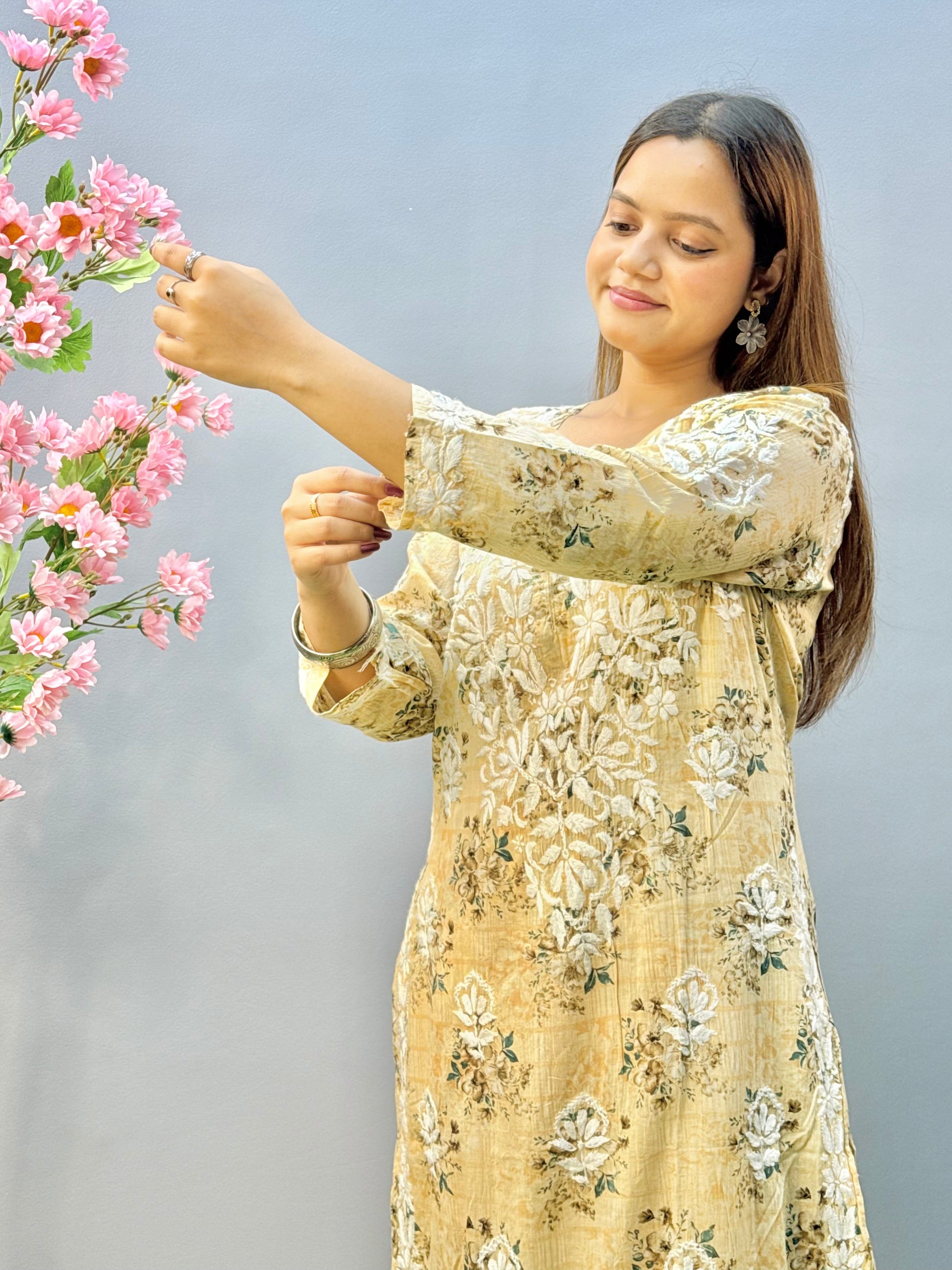Beige floral mulmul chikankari kurta and palazzo set with lace detailing