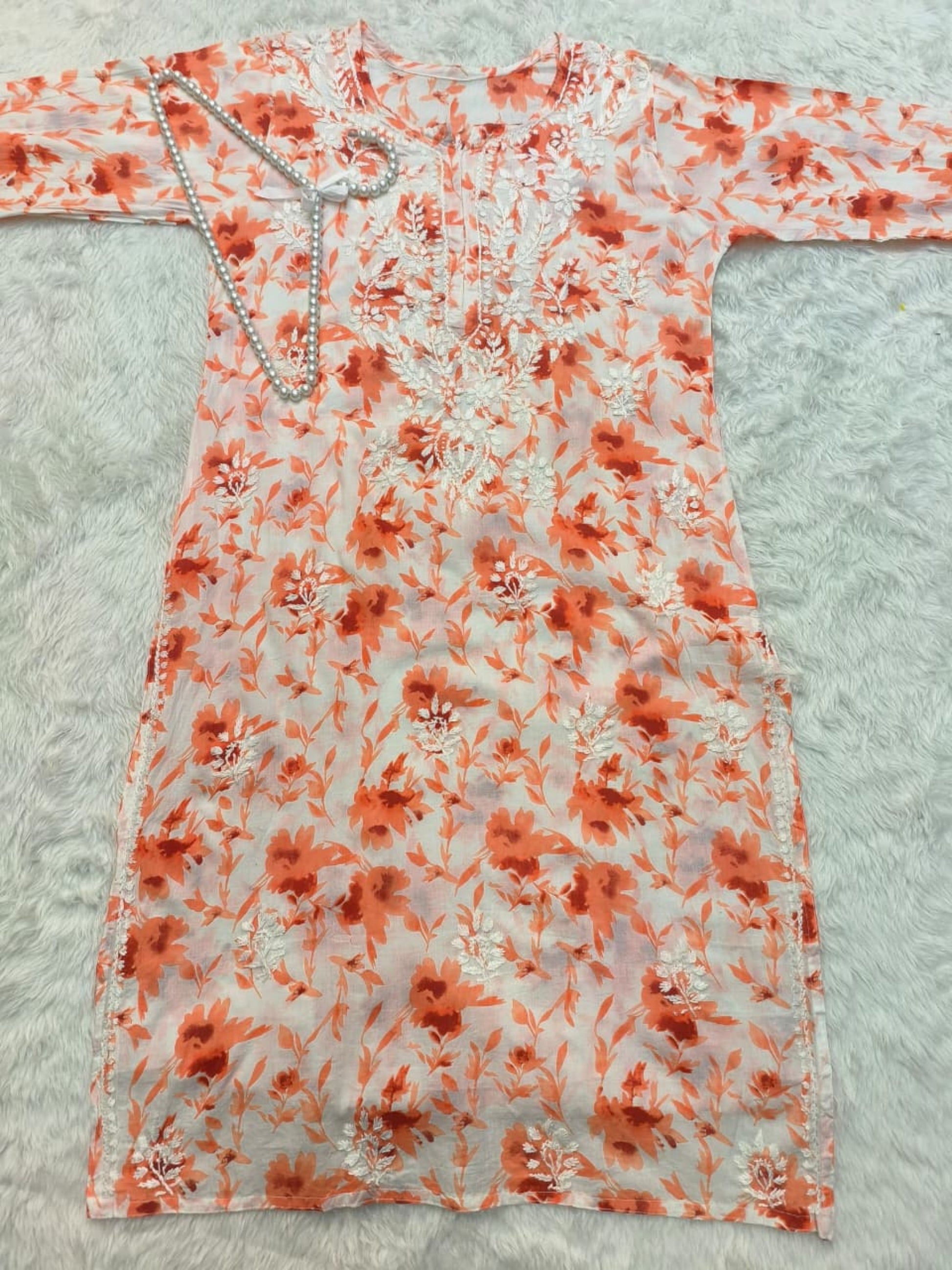 Orange printed mulmul chikankari kurta with hand embroidery