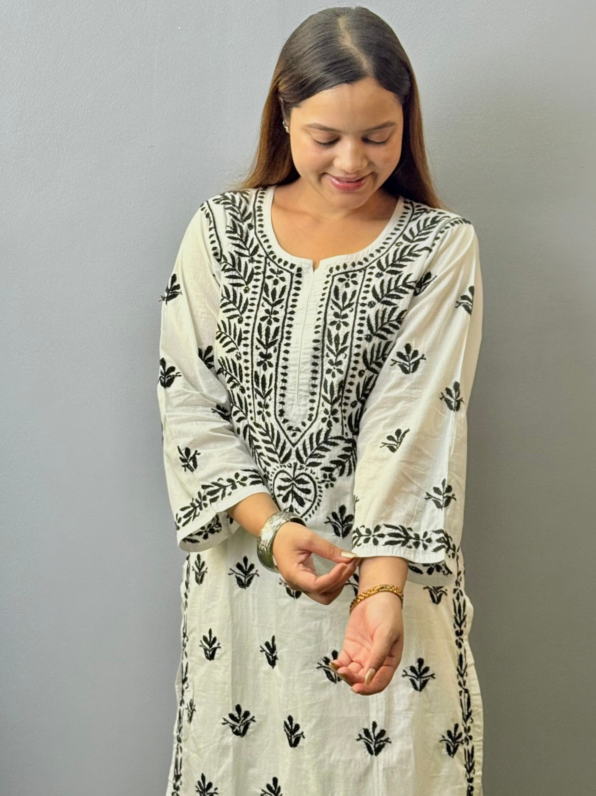 Ivory white mulmul chikankari kurta with black hand embroidery work