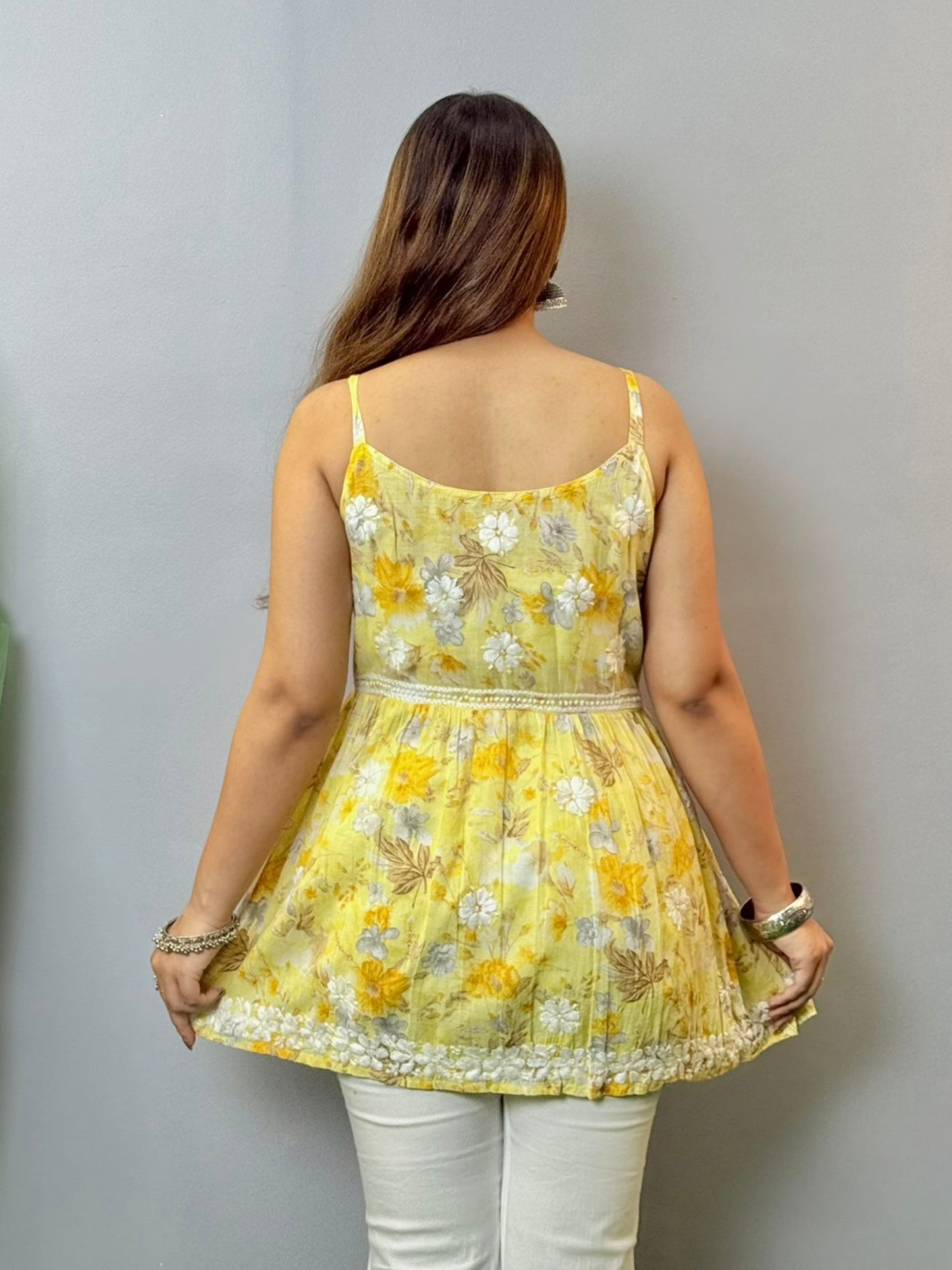 Mustard yellow floral printed mulmul chikankari short kurta with sleeveless straps and delicate hand embroidery
