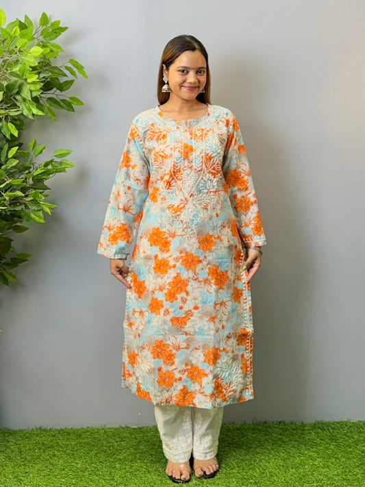 Model wearing sky blue and orange printed chikankari crape kurta with white embroidery