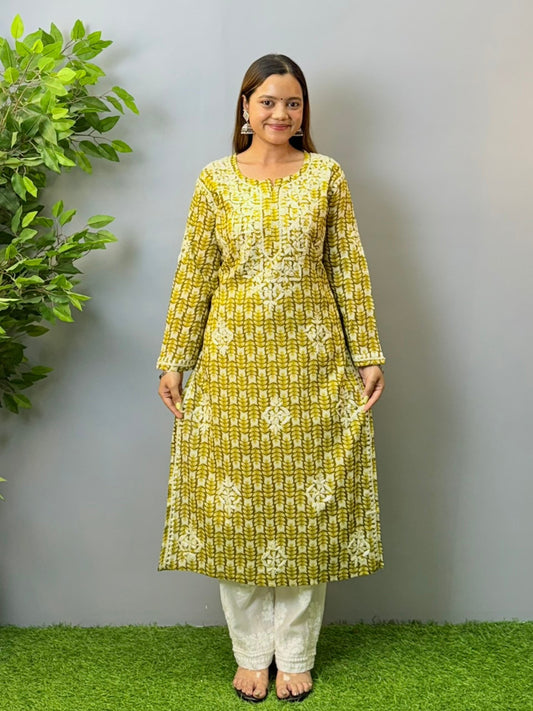 Model in olive green printed mulmul chikankari kurta with hand embroidery