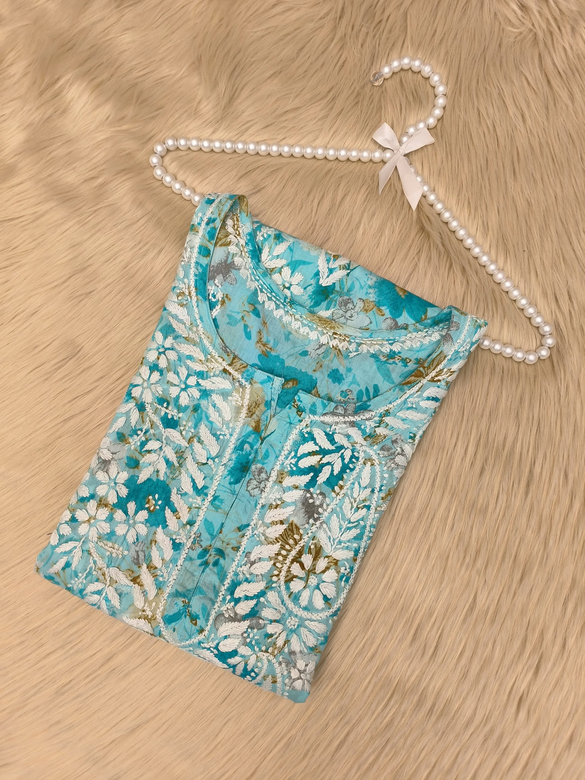 Turquoise floral printed mulmul chikankari kurta with white and mustard embroidery