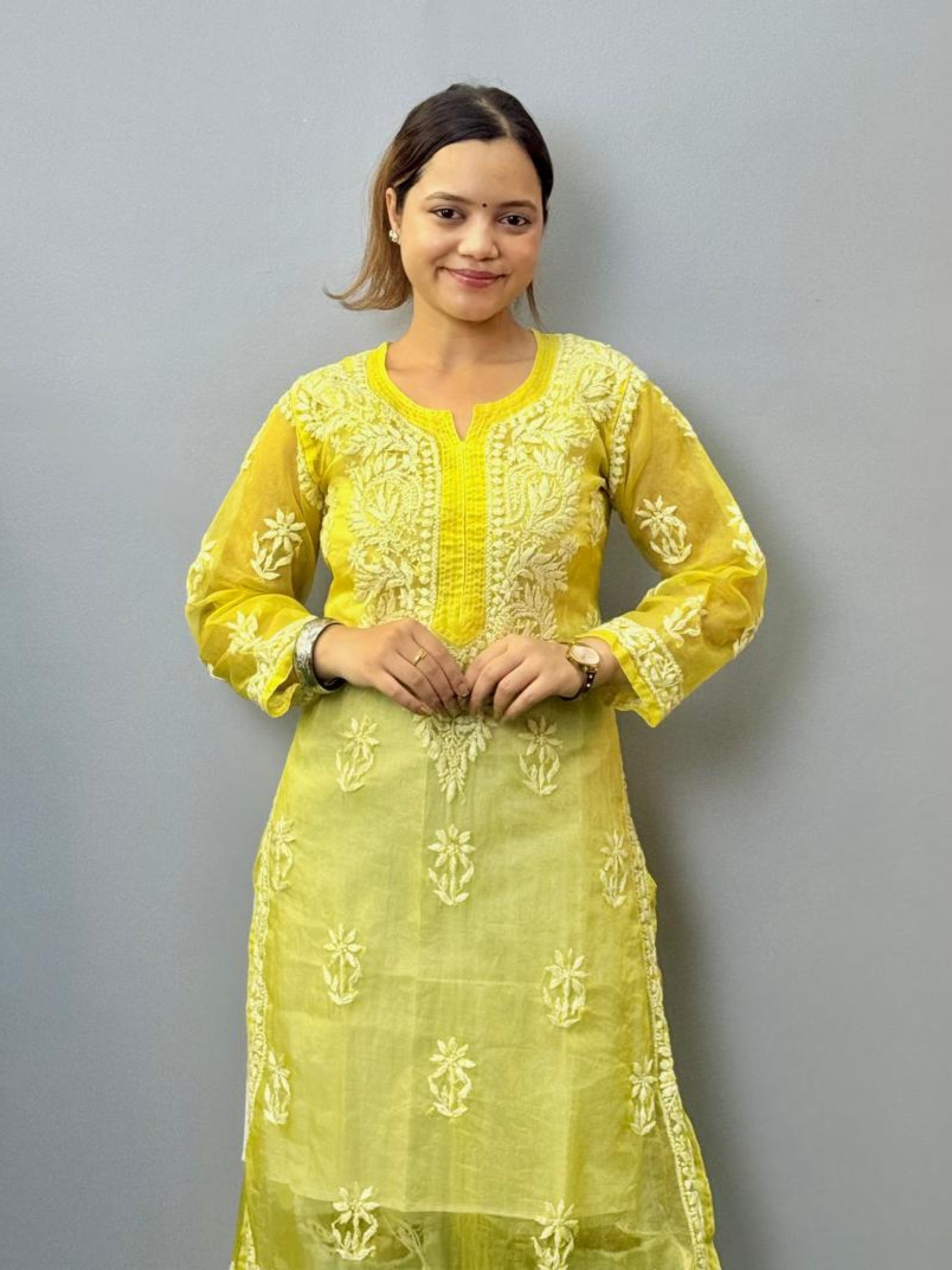 Lemon yellow sheer organza chikankari kurta with hand embroidery in white thread