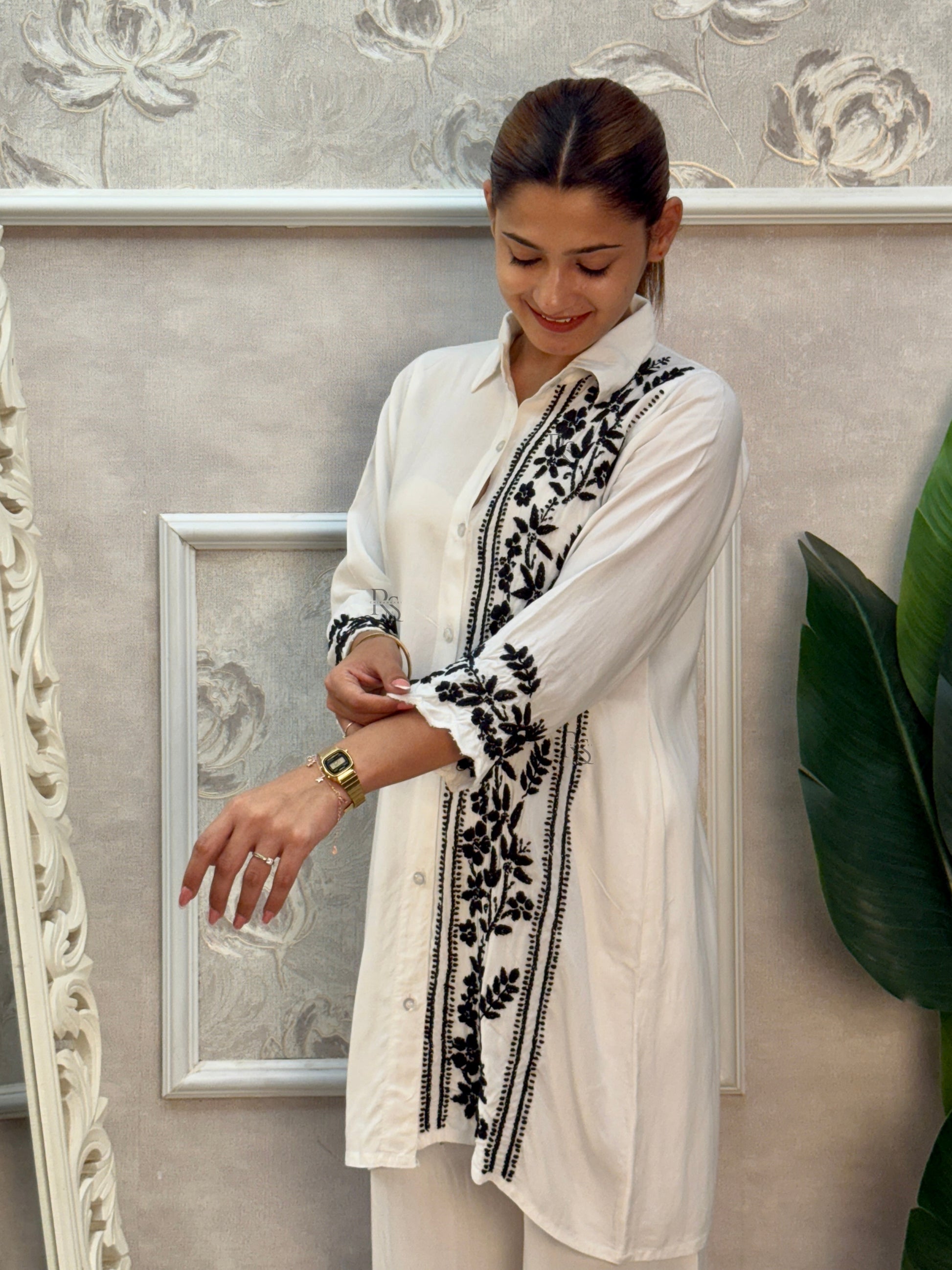 White rayon Lucknow Chikankari kurta and palazzo set with black thread hand embroidery