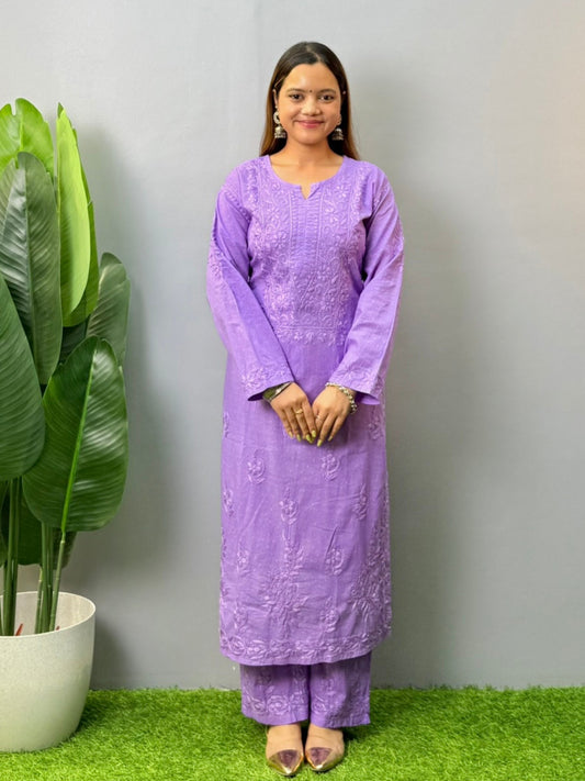 Model wearing lavender dobby cotton chikankari kurta and pant set
