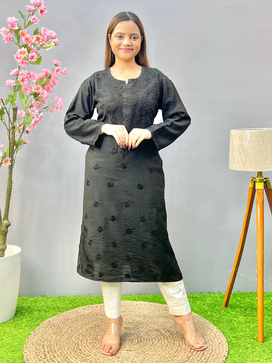 Woman wearing a premium classic black Chanderi Lucknowi Chikankari straight cut kurta with tone-on-tone embroidery, full sleeves, by R S CHIKANKARI.