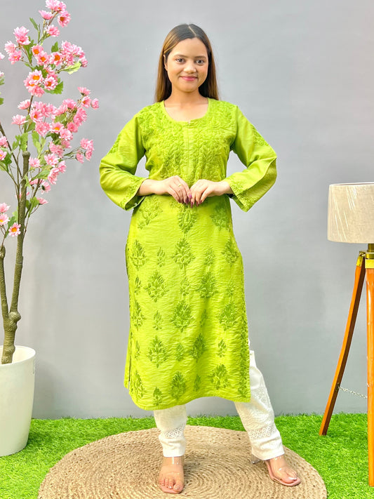 Woman wearing a premium lime green Chanderi Lucknowi Chikankari straight cut kurta with tone-on-tone embroidery, full sleeves, by R S CHIKANKARI.