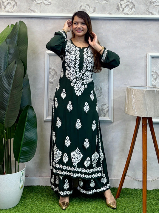 Dark green Lucknow Chikankari kurta and palazzo set in modal fabric with white hand embroidery.