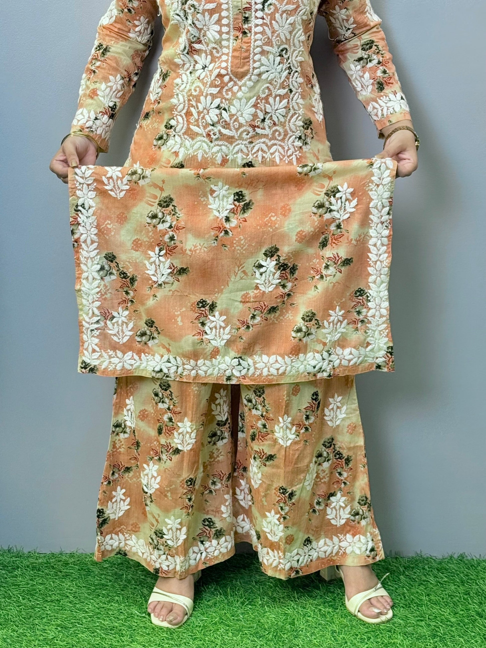 Peach floral printed mulmul chikankari kurta palazzo set with hand embroidery