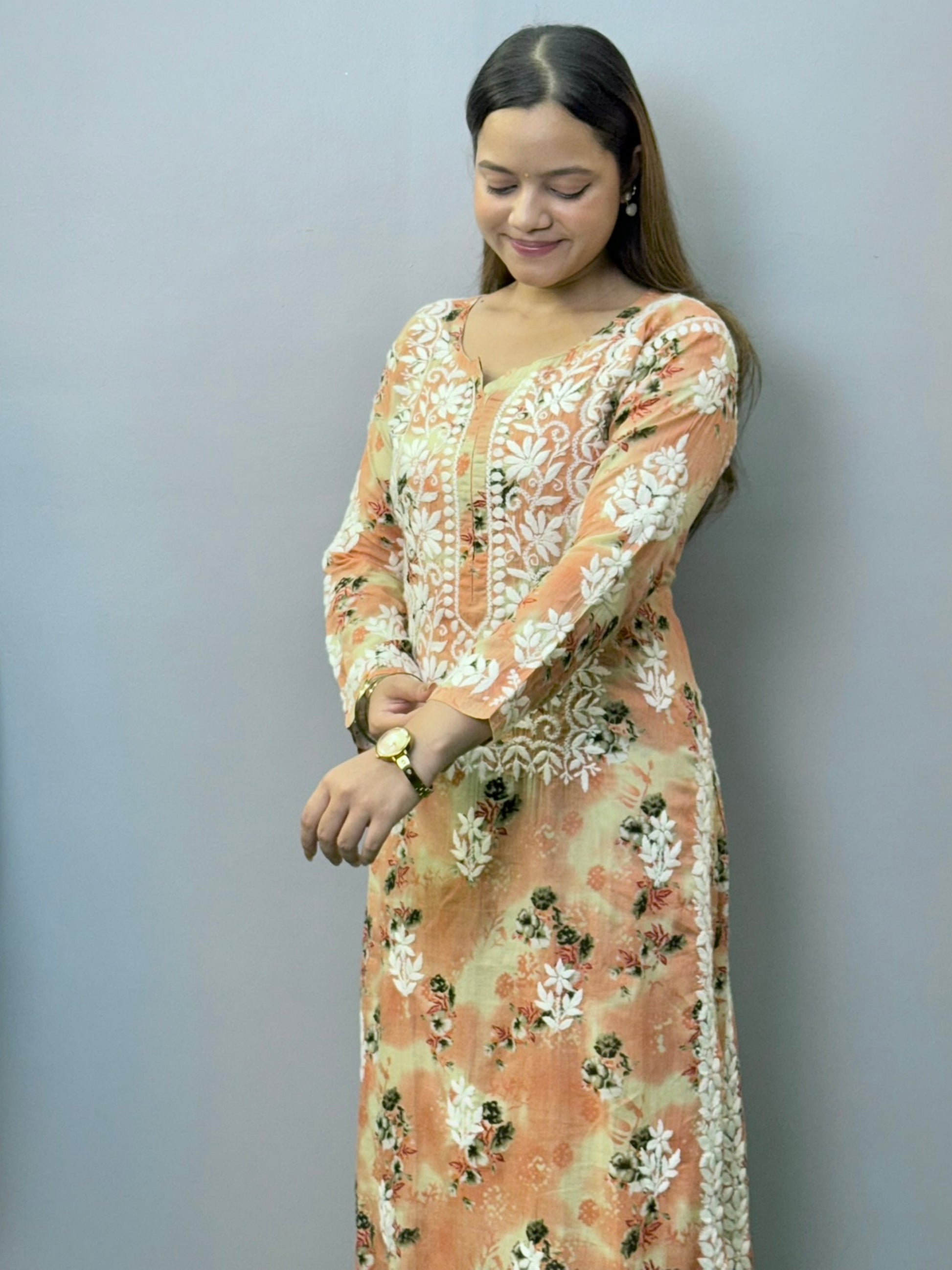 Peach floral printed mulmul chikankari kurta palazzo set with hand embroidery