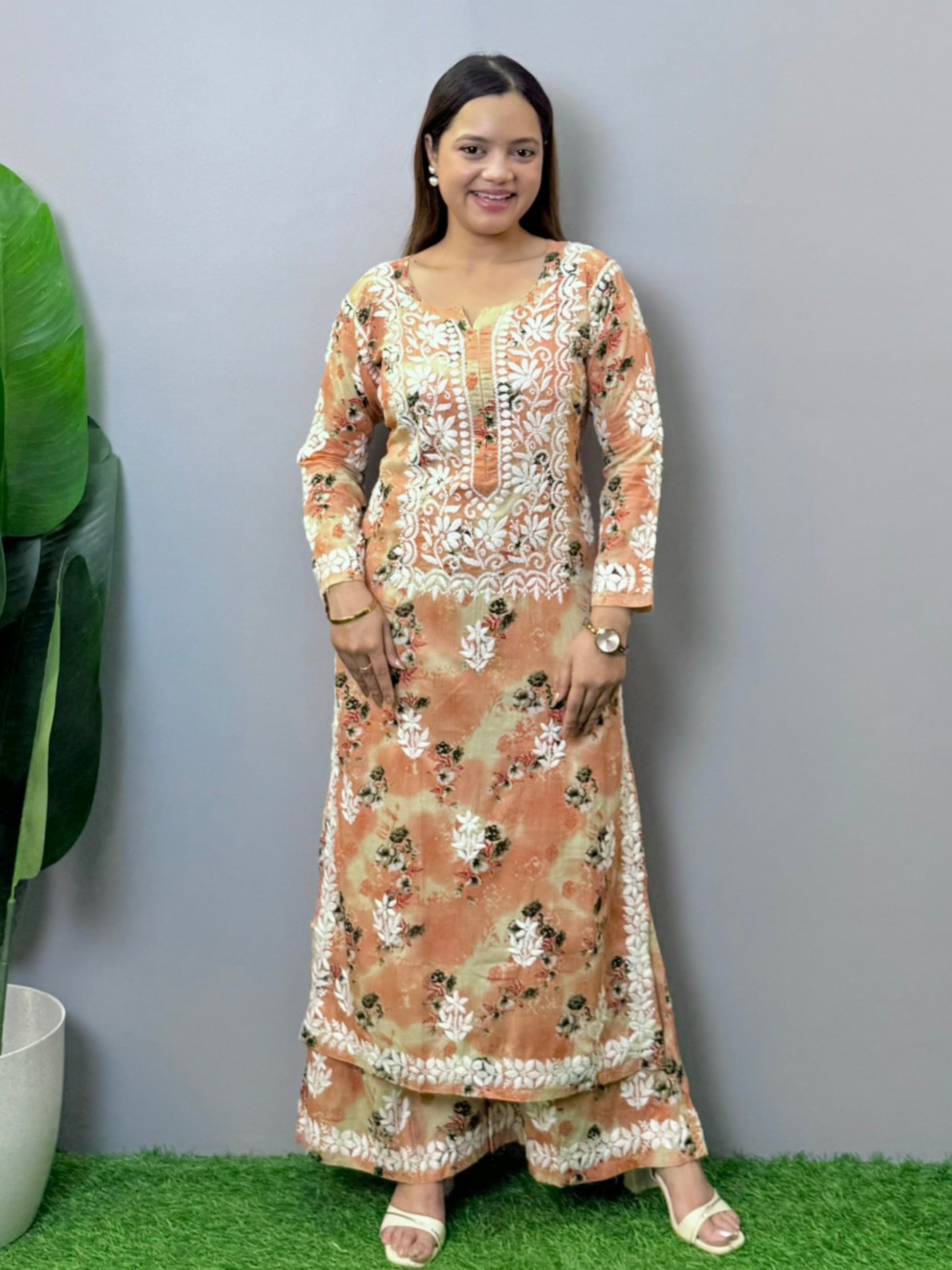 Peach floral printed mulmul chikankari kurta palazzo set with hand embroidery