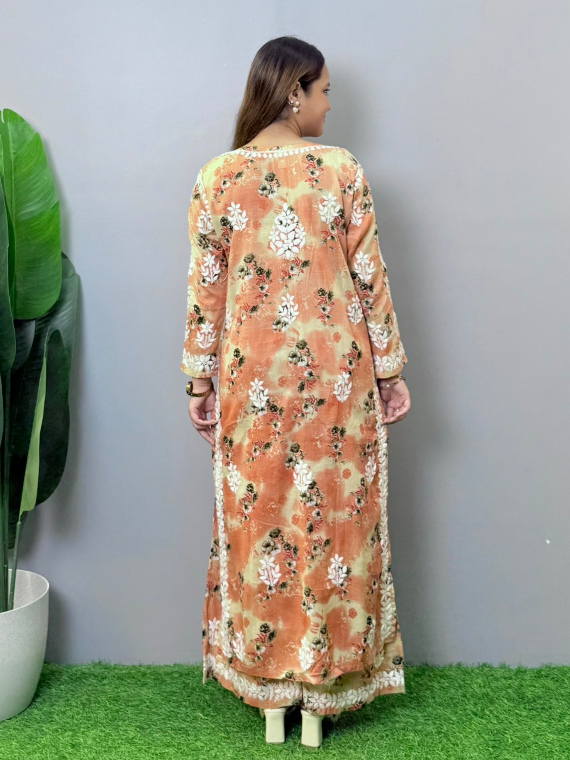 Peach floral printed mulmul chikankari kurta palazzo set with hand embroidery