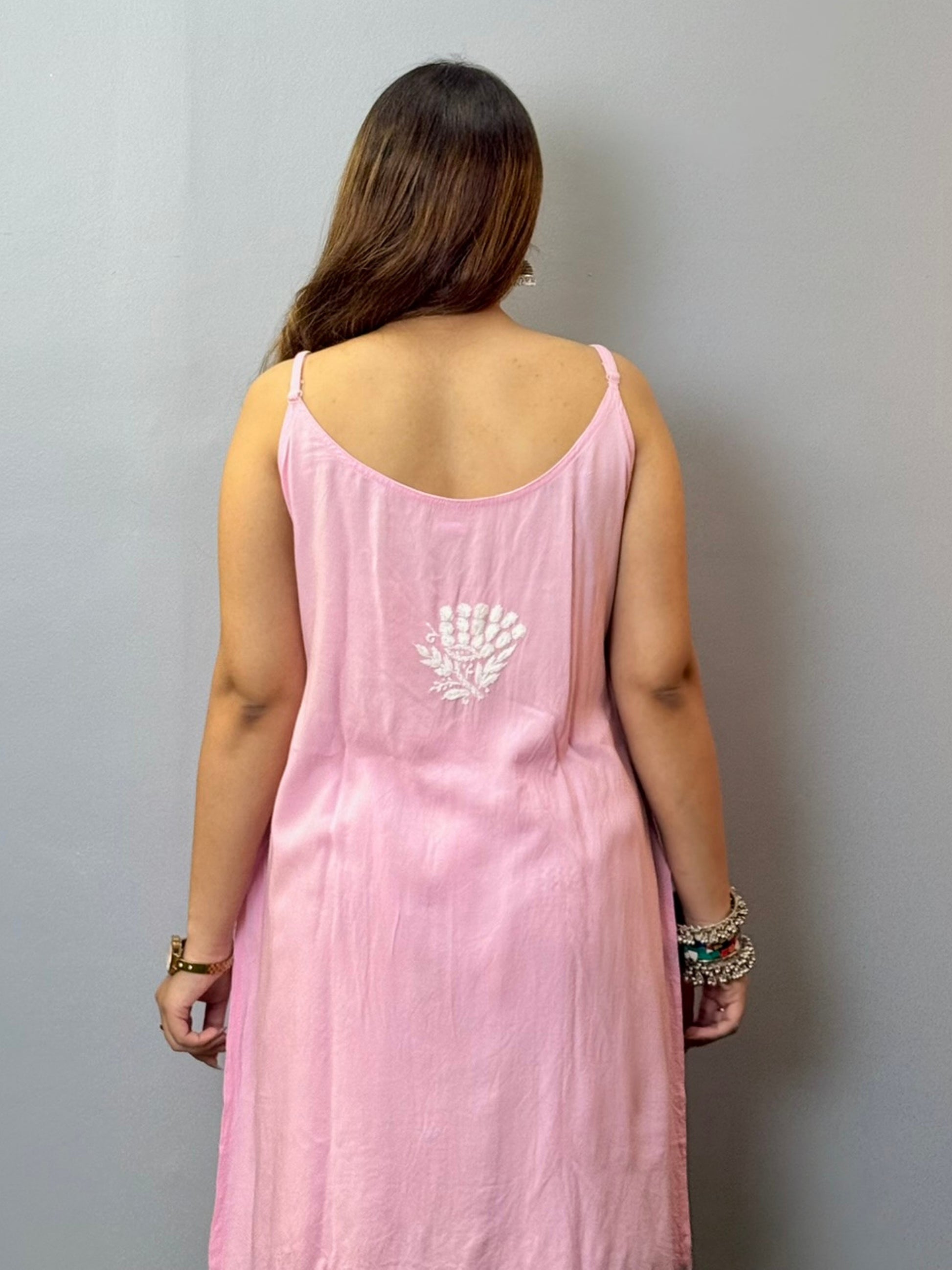 Baby pink sleeveless rayon Lucknowi Chikankari short kurta with white hand embroidery