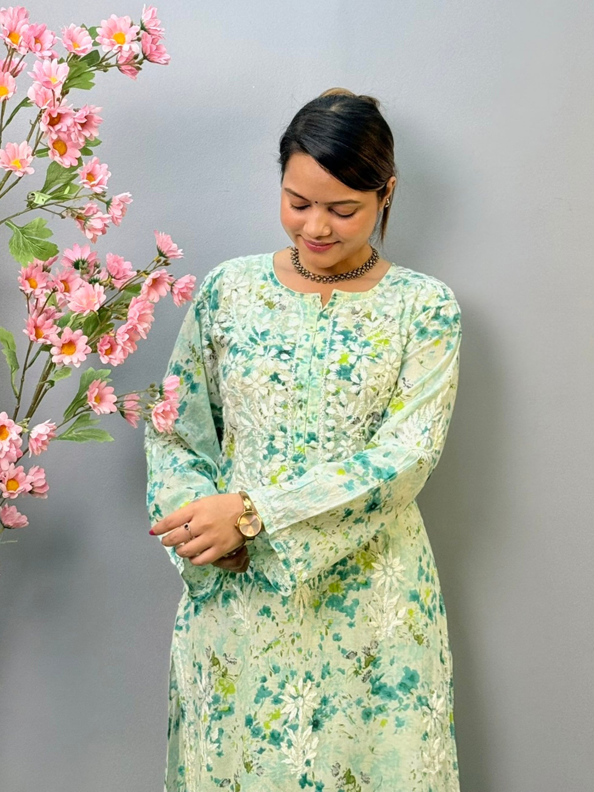 Green floral printed mulmul Chikankari kurta and palazzo set with white hand embroidery for women