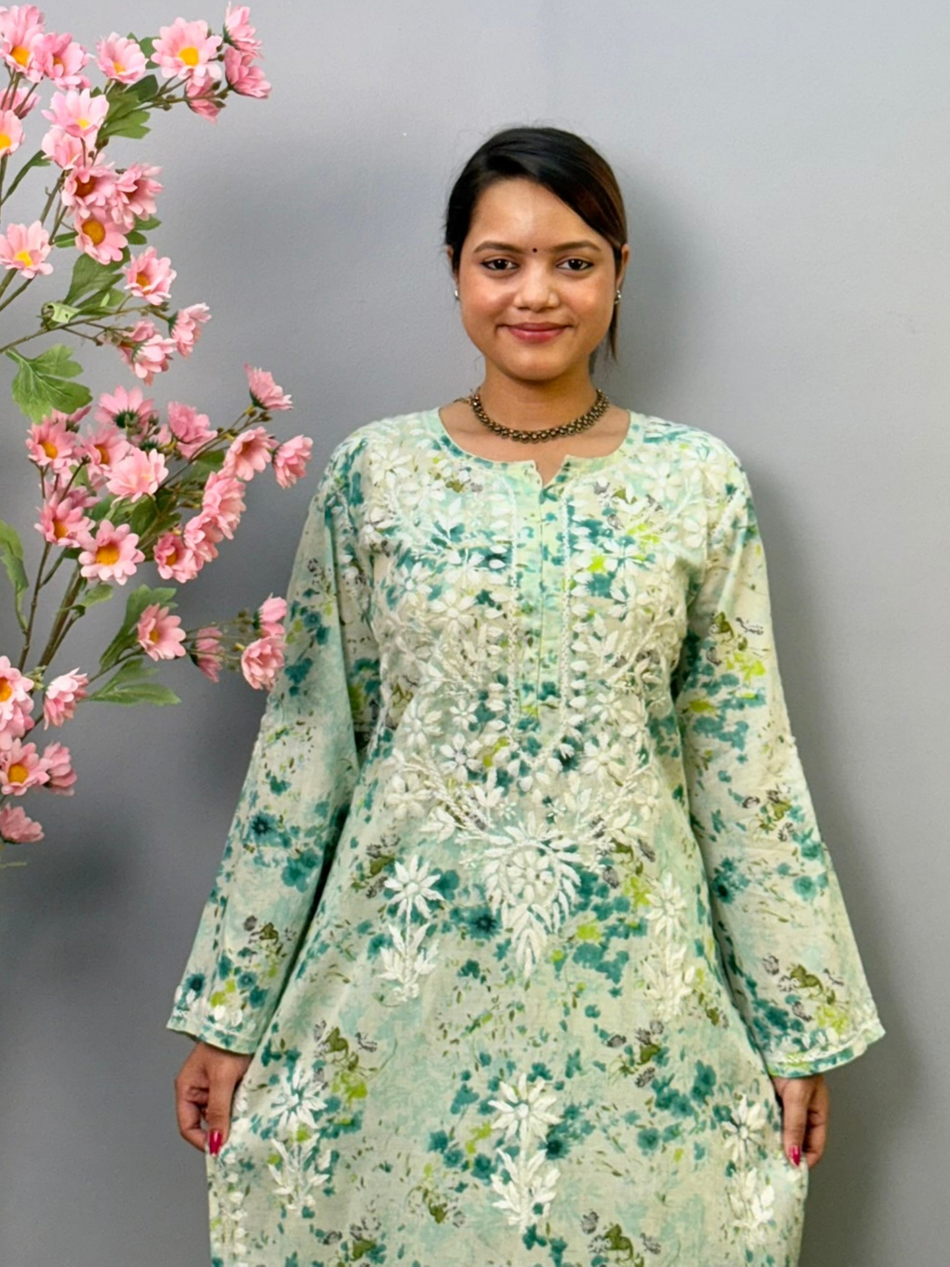 Green floral printed mulmul Chikankari kurta and palazzo set with white hand embroidery for women