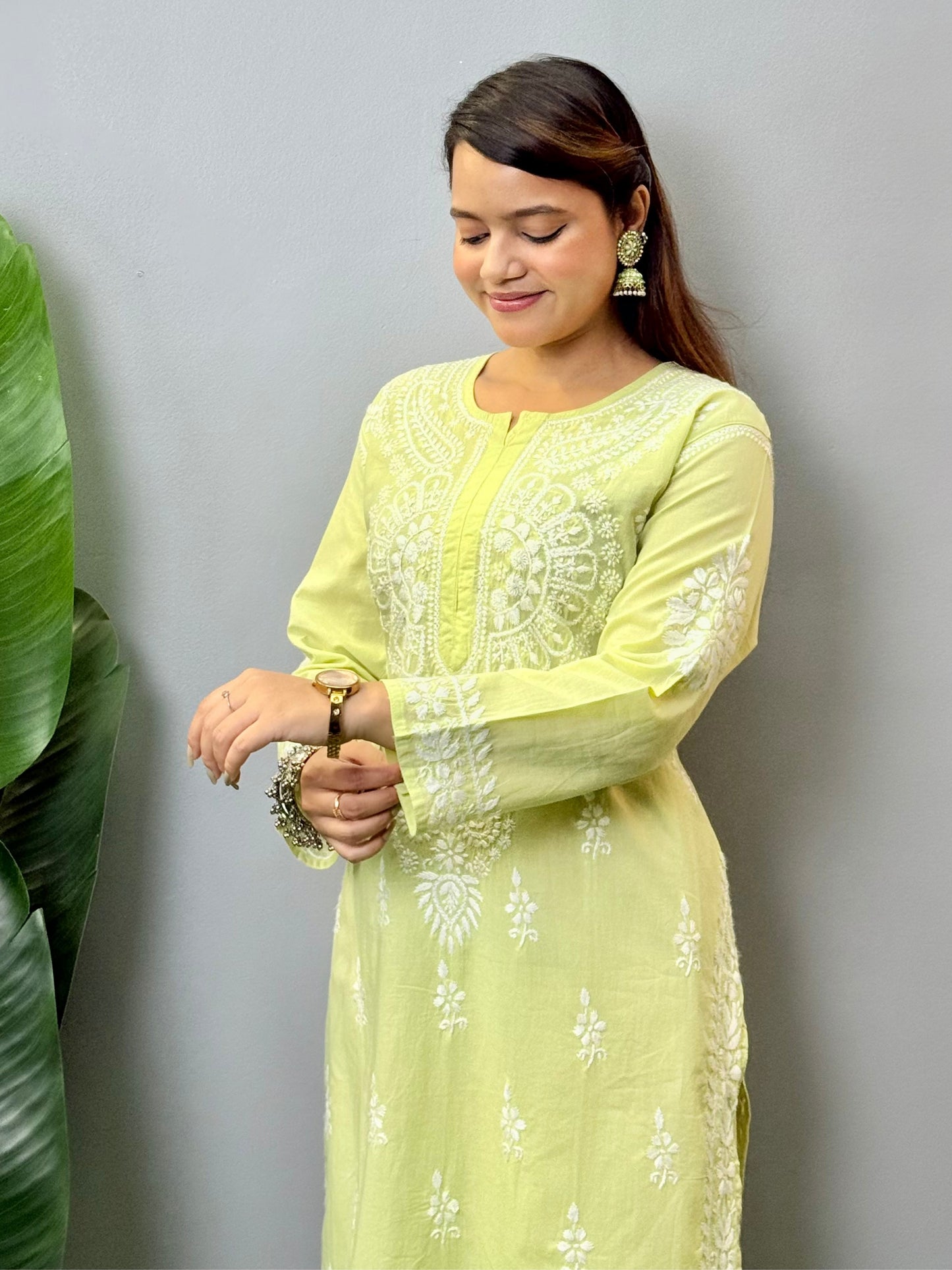 Light green cotton Lucknow Chikankari kurta and palazzo set with hand embroidery – premium quality ethnic wear.