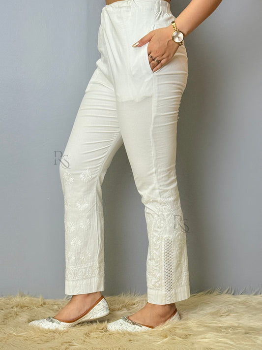 White stretchable cotton chikankari pant with hand embroidery and lace detailing