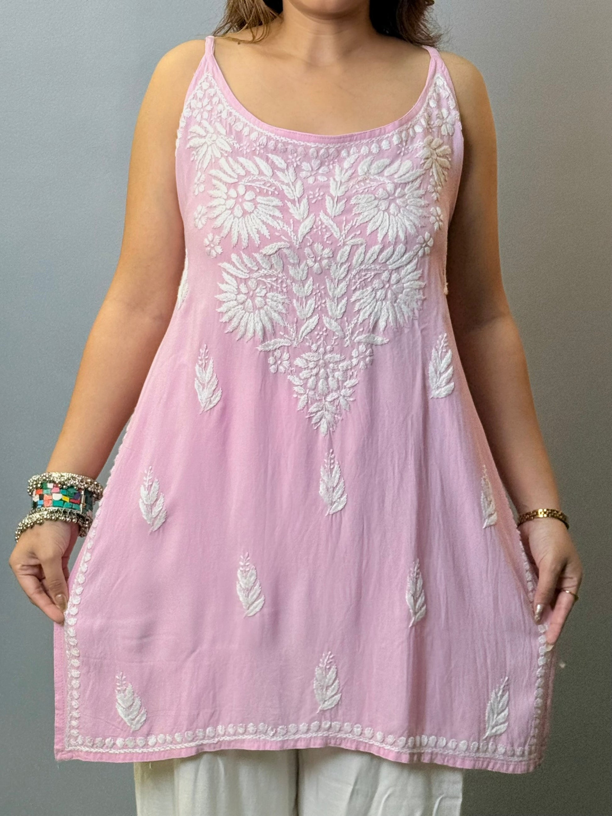 Baby pink sleeveless rayon Lucknowi Chikankari short kurta with white hand embroidery